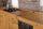 Cucina lineare stile misto INDUSTRIAL / COUNTRY legno massello ad effetto vissuto predisposizione elettrodomestici 465x65xh90 cm