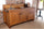 Cucina lineare con schienale rialzato stile COUNTRY / INDUSTRIAL legno massello con predisposizione lavello 180x65xh85 cm
