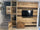Wooden TV stand wall RUSTIC style frame and covering in solid recycled wood multicolored effect 290x35xh280cm MADE TO MEASURE