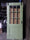 Porta scorrevole con inglesina in vetro stile INDUSTRIAL legno massello verde salvia scorrimento su binario 100xh220 cm spessore 42mm personalizzabile
