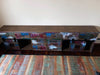 Credenza Madia modello Marilena stile industrial shabby multicolore in legno con 2 ante scorrevoli e 12 cassetti – 300×40×80 cm