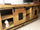 Sideboard im Industriestil, Massivholz, Schiebetüren auf Schienen und offene Fächer, 160 x 50 x 70 cm