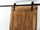 Porta scorrevole per interni stile INDUSTRIAL legno massello scorrimento a carrucole su binario in ferro 95xh220 cm personalizzabile